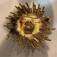 Load image into Gallery viewer, Monet Signed Gold Starburst Brooch
